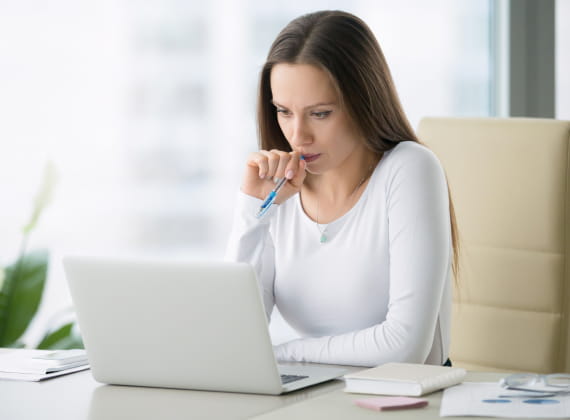 Girl working on her laptop.