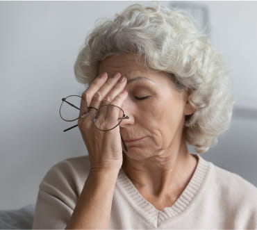 Woman having headache.